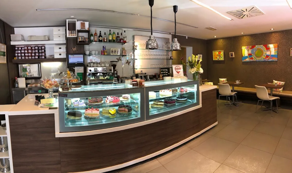 BookNoFees: Café – Kavarna Čopomana – Ljubljana – Café Čopomana, fotografia 1